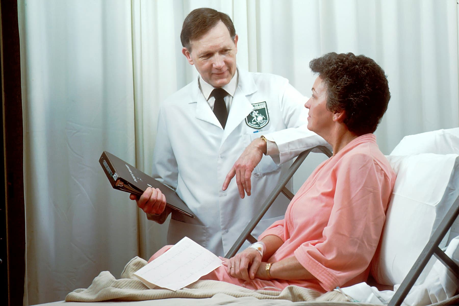 Physician speaking with a patient