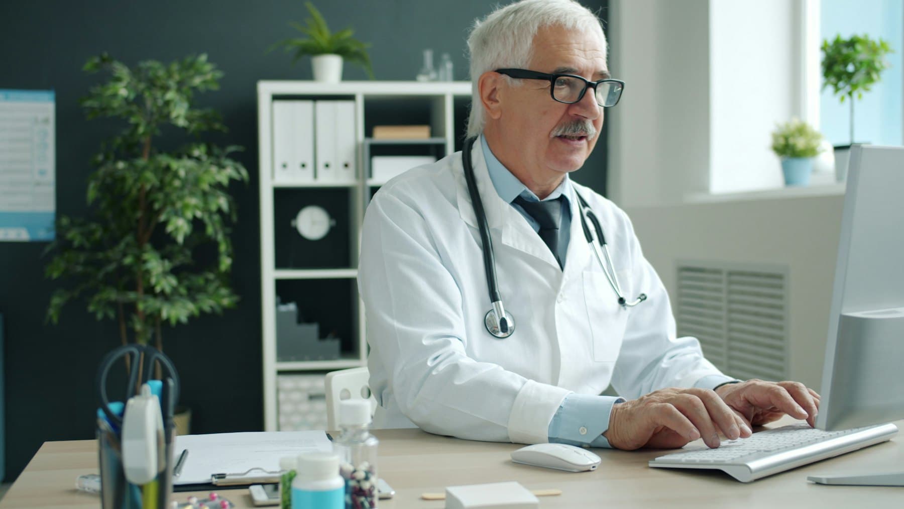 Senior physician at his desk